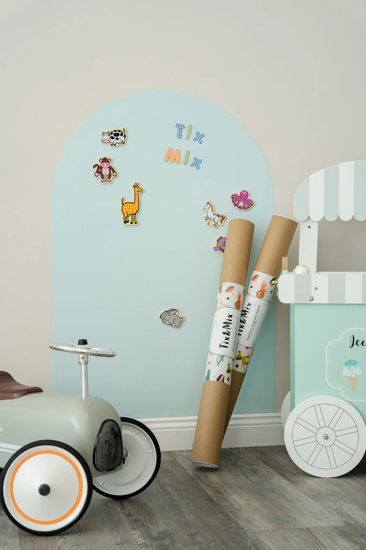 A product image of Tix&Mix blue dream magnetic wall decal featuring wooden animal toys.