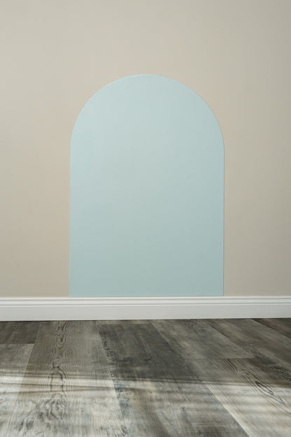 A Tix&Mix cyan blue magnetic wall decal secured on a clean wall.